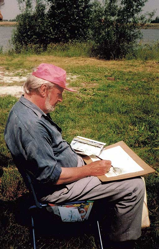 Peter Unger painting in the open air.