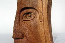 Indean head in oak by Peter Unger.
